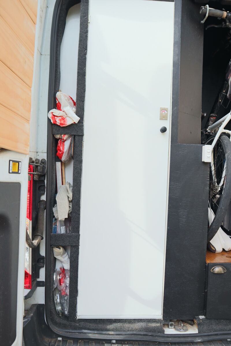 Shower door from rear of van